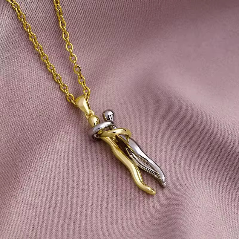 couple hug necklace